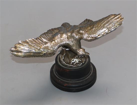 A plated eagle car mascot with indistinct mark Height 15cm